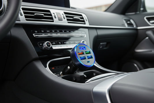 Car dashboard with a GPS device mounted on the air vent