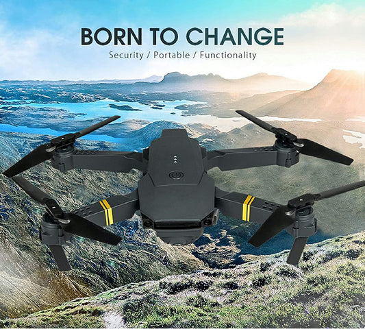 Black drone with yellow accents flying over a scenic landscape with mountains and water.