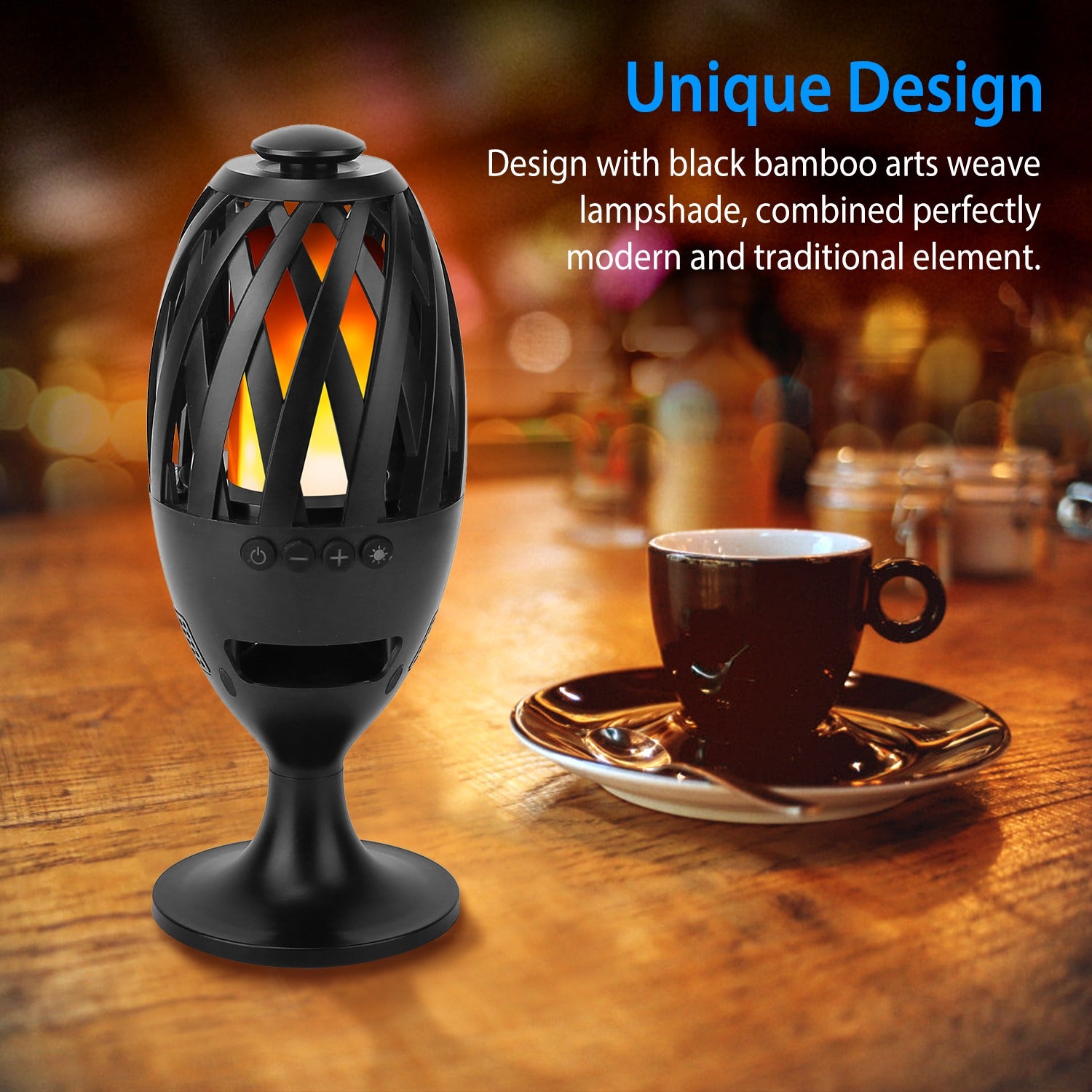 Black bamboo arts weave lampshade with a lit candle on a wooden table next to a coffee cup.