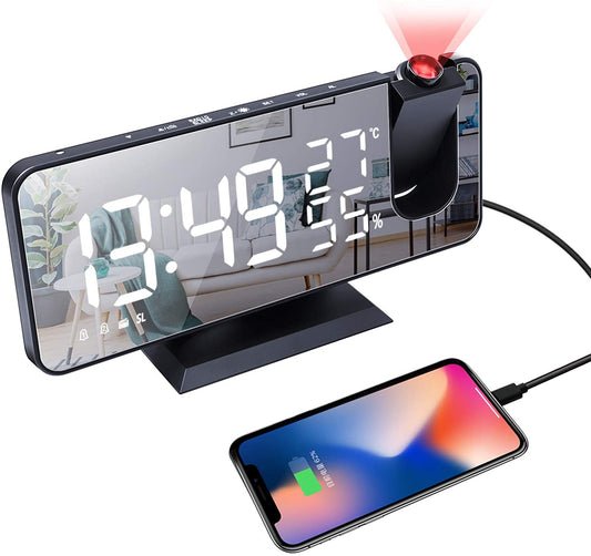 Digital clock with smartphone charging cable on a white background