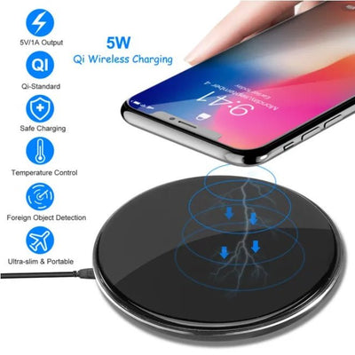 Wireless charging pad with smartphone on a white background, featuring Qi wireless charging technology.