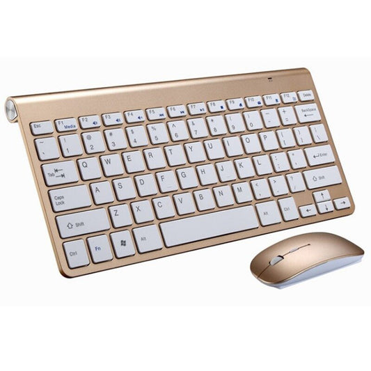 Gold and white keyboard and mouse set on a white background