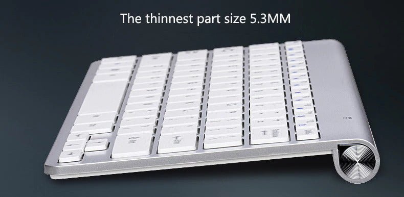 Thin keyboard with text indicating thickness on a dark background