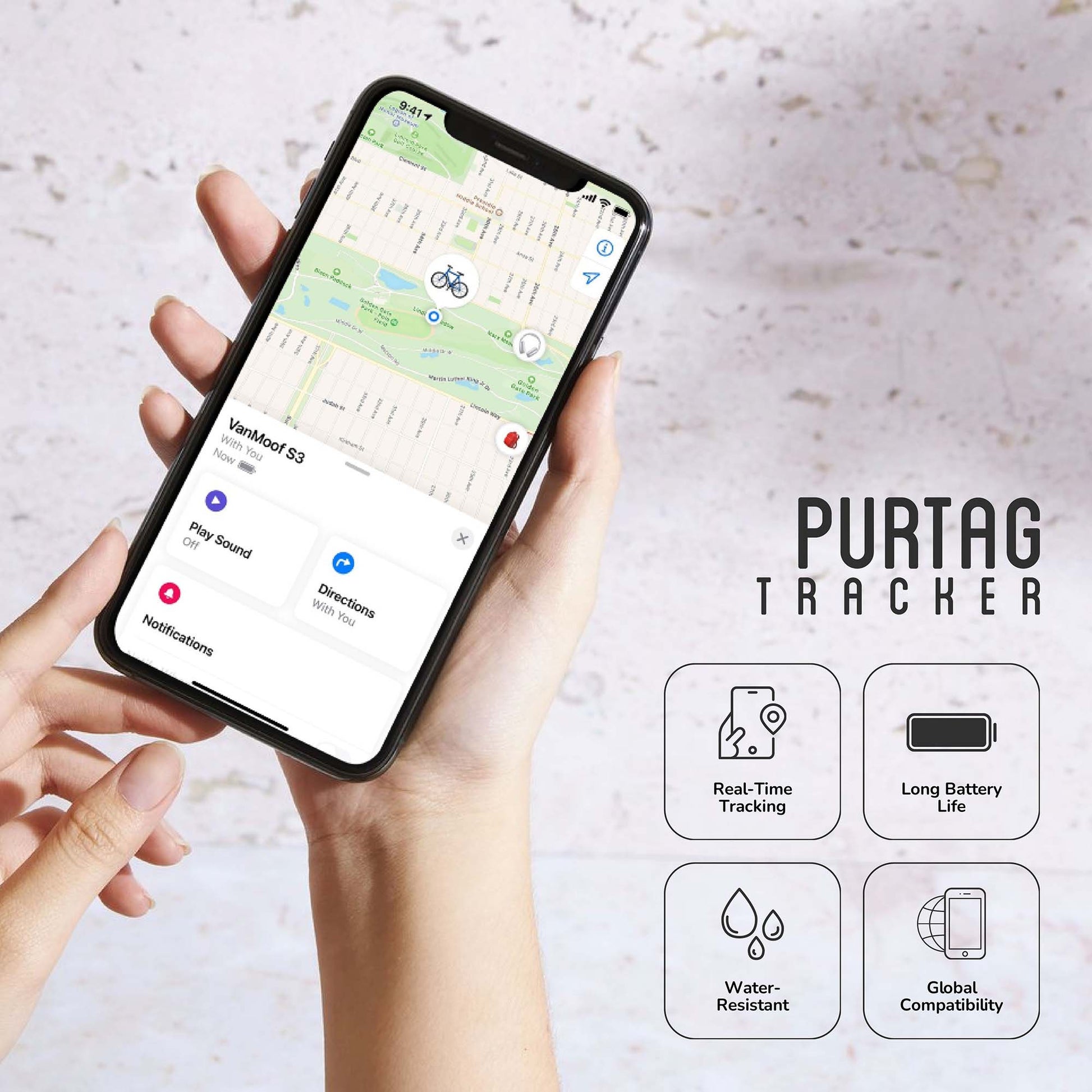Hand holding a smartphone with a mapping app displayed, featuring Purtag Tracker branding and features.